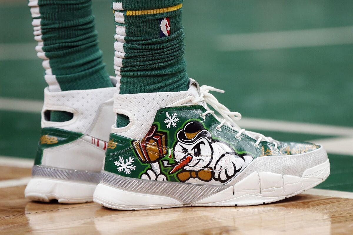 Boston Celtics' Marcus Morris wears holiday themed shoes on the court. (Michael Dwyer / AP)