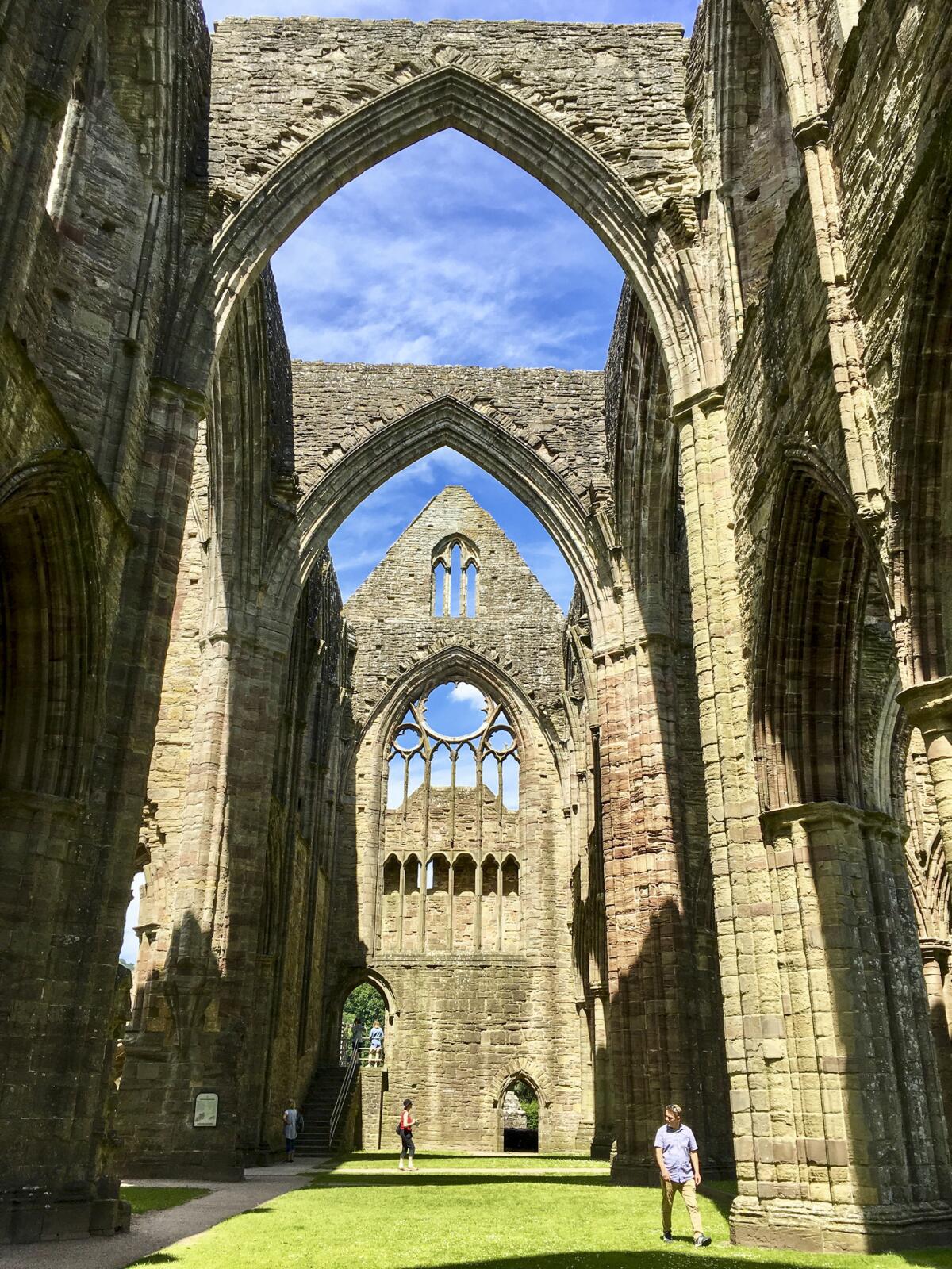 Tintern Abbey, one of Wales' greatest monastic ruins, was founded by the lord of nearby Chepstow Castle in 1131 and completed around 1300. It stands today much as it did then, except for the lack of a roof and windows.