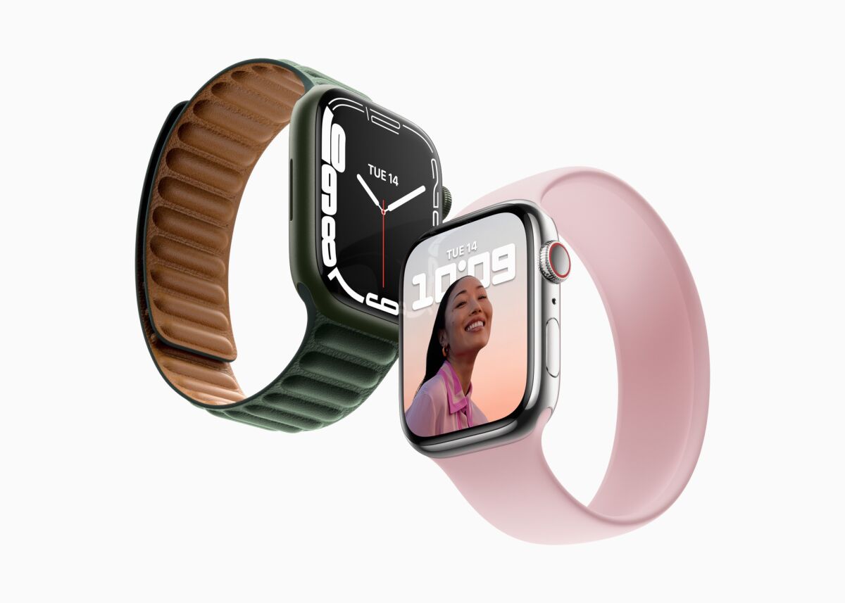 A black and a pink Apple Watch