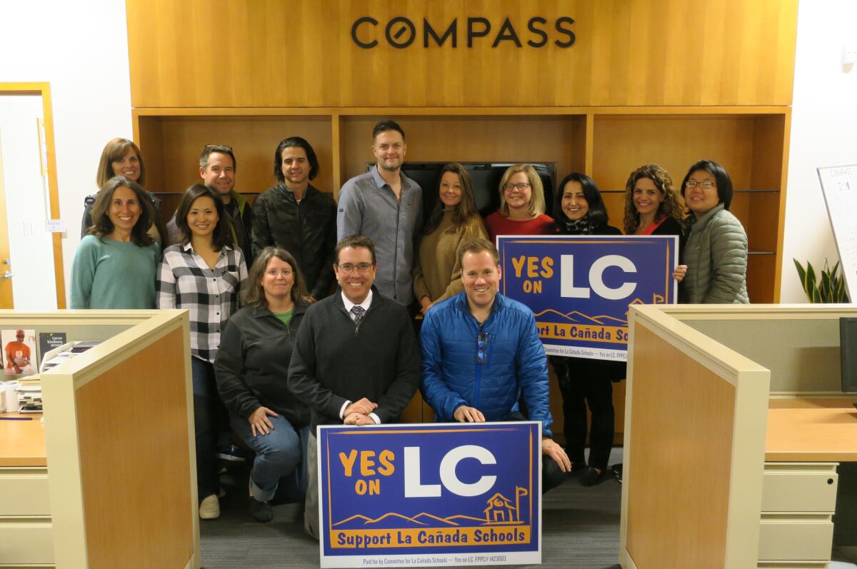 A group of La Cañada Unified volunteer parents and educators made calls during a Jan. 16 phone banking session at Compass Realty in support of extending a parcel tax that brings an annual $2.6 million in funding for local schools and programs.