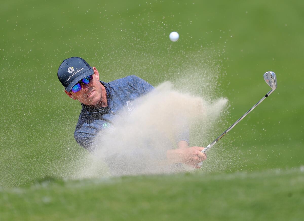 Justin Leonard hits out of a bunker at the Hoag Classic on Friday at Newport Beach Country Club on Friday.