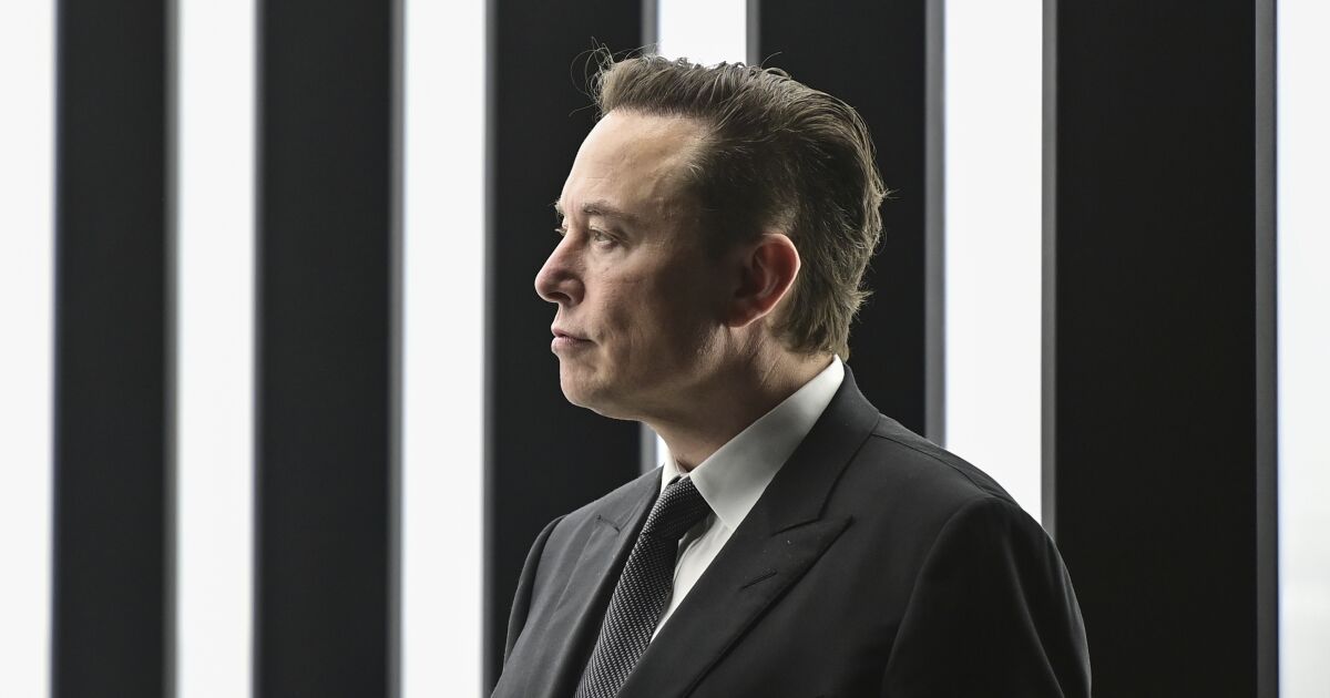 Column: By embracing anti-Fauci and QAnon conspiracies, Musk tests how low Twitter can sink