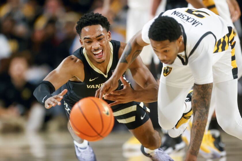Virginia Commonwealth guard Zeb Jackson (2) steals the ball from Vanderbilt guard Tyrin Lawrence (0) during the first half of an NCAA college basketball game, Wednesday, Nov. 30, 2022 at Seigel Center in Richmond, Va. (Shaban Athuman/Richmond Times-Dispatch via AP)