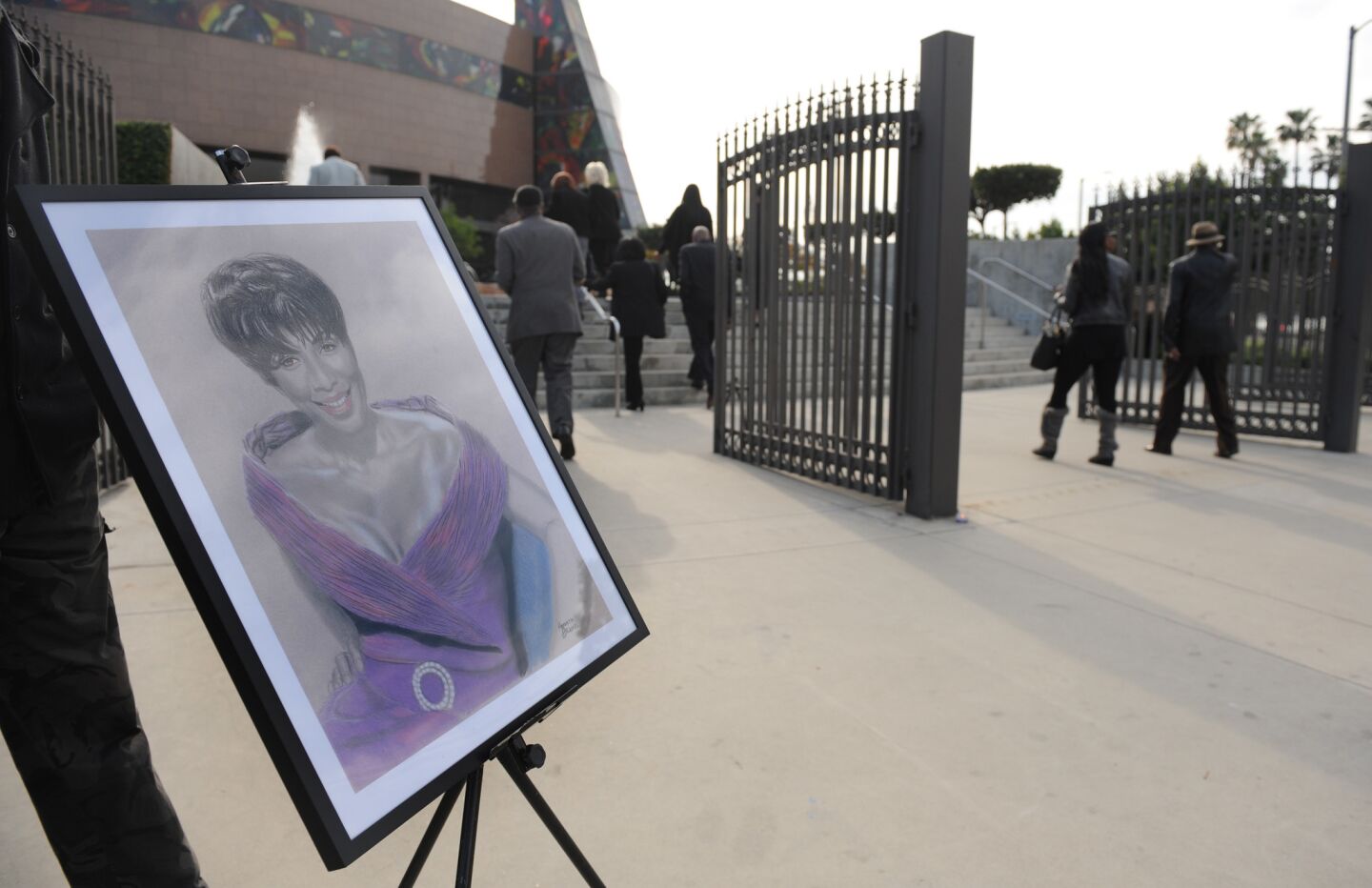 An artist's rendering of singer Natile Cole sits outside the West Angeles Church of God in Christ.