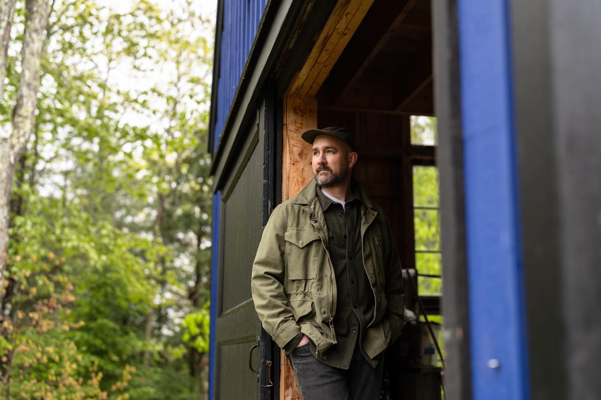 Children's book author Peter Brown wrote his original "Wild Robot" book in Maine and now lives there among nature.