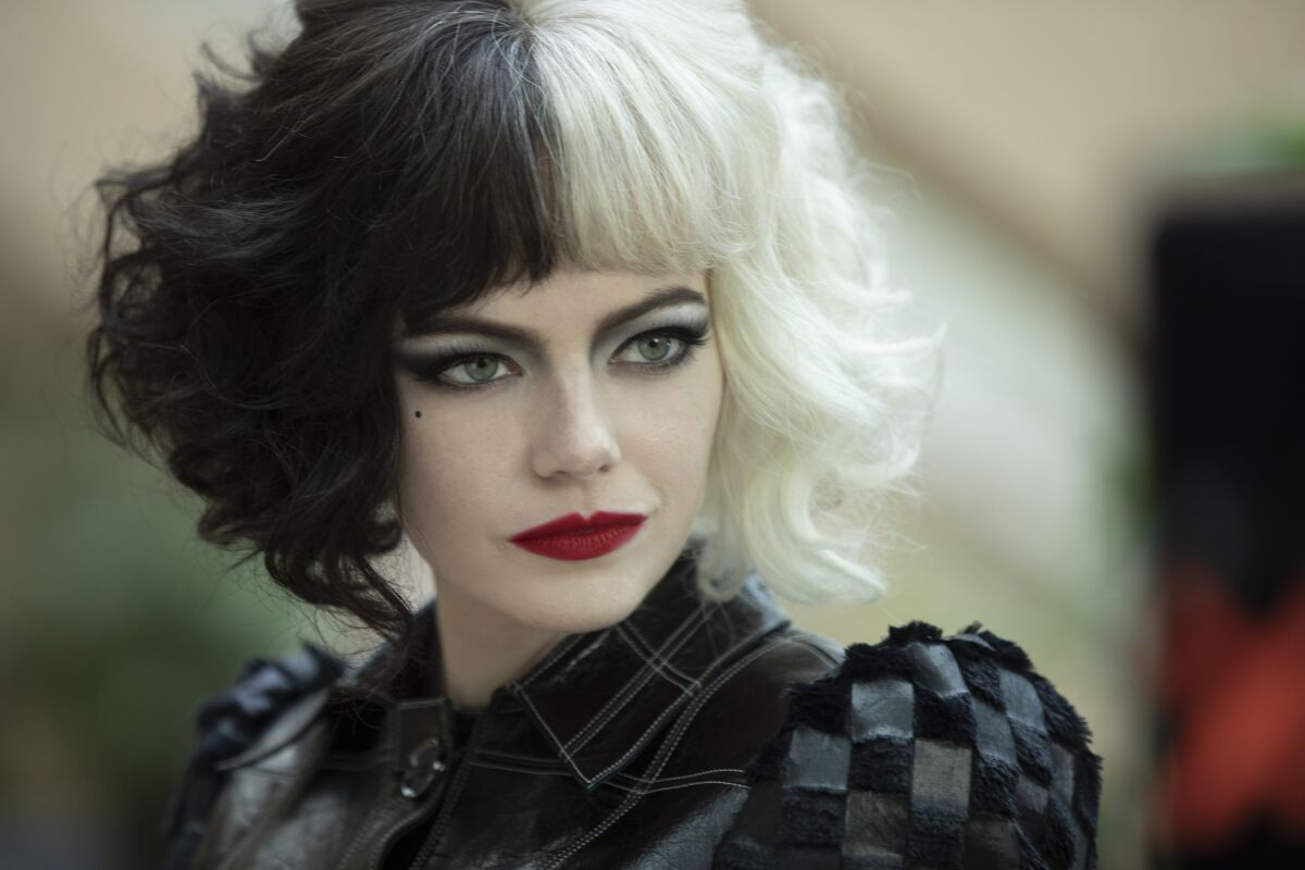 Emma Stone with black-and-white hair in "Cruella"