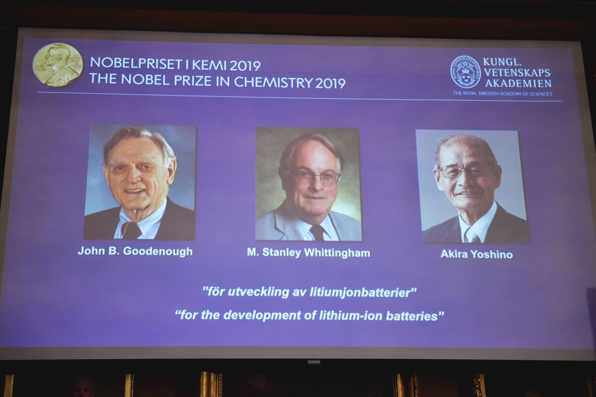  Images of John B. Goodenough, M. Stanley Whittingham and Akira Yoshino, winners of the 2019 Nobel Prize in chemistry, are projected on a screen in Stockholm.