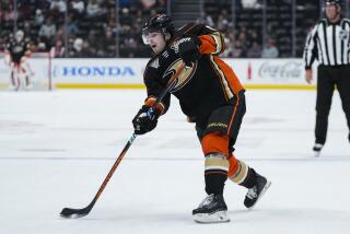 Anaheim Ducks defenseman Jamie Drysdale shoots against the Winnipeg Jets.