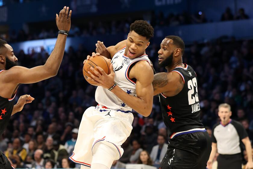 Giannis Antetokoumpo, driving against LeBron James (right) and James Harden (left) during the 2019 NBA All-Star game, is the only sure bet among Eastern Conference starters.