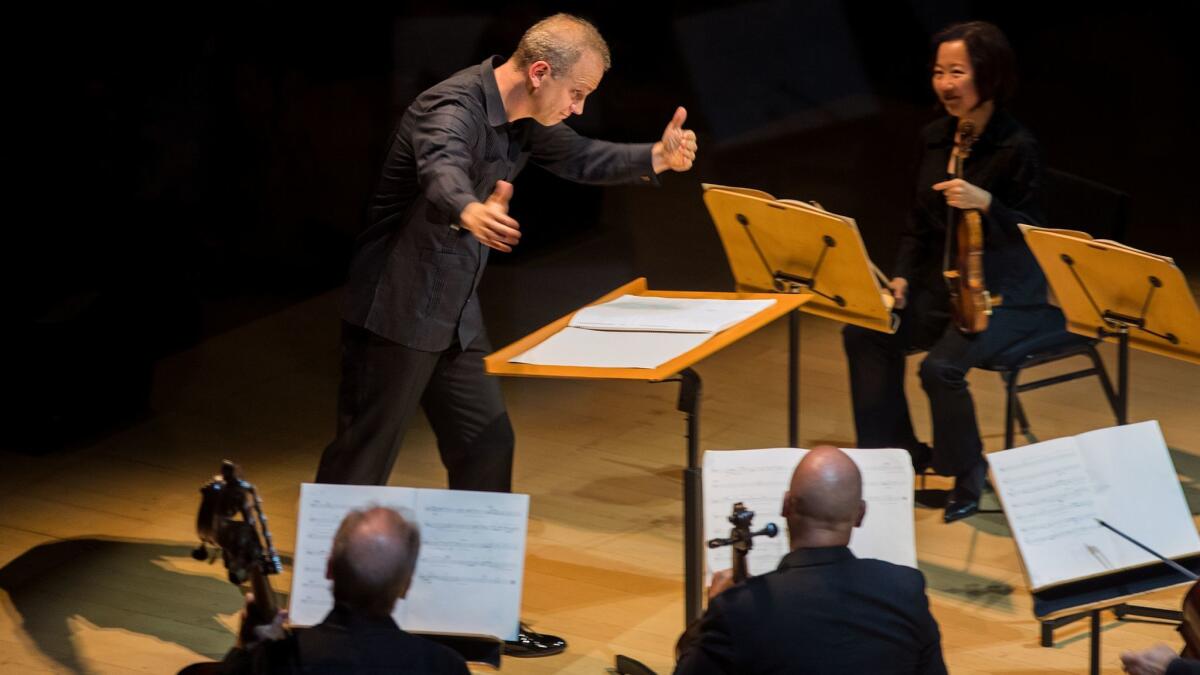 Carlos Miguel Preto conducts the Los Angeles Philharmonic New Music Group at Walt Disney Concert Hall on Tuesday night for the final concert of the orchestra's CDMX festival.