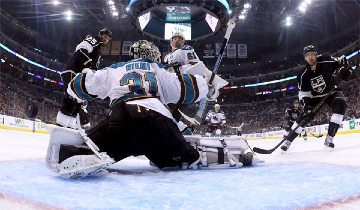 Drew Doughty scores a power-play goal for the Kings in a night L.A. scored three times with the advantage to claim a 4-3 victory over the San Jose Sharks in Game 2 of their playoff matchup on Thursday.