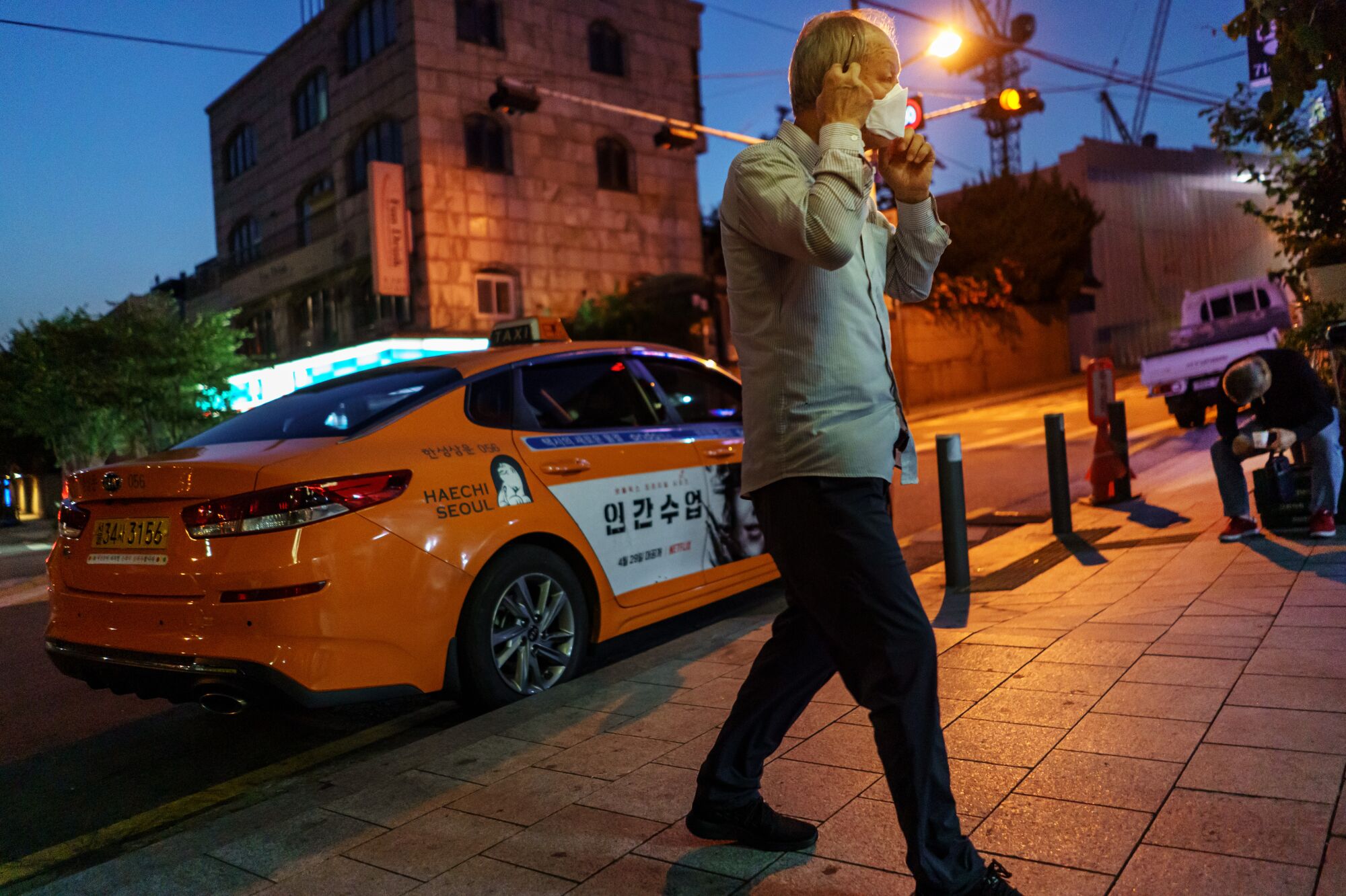 A taxi driver arrives for dinner at Ilsin Gisa Sikdang, a driver restaurant.