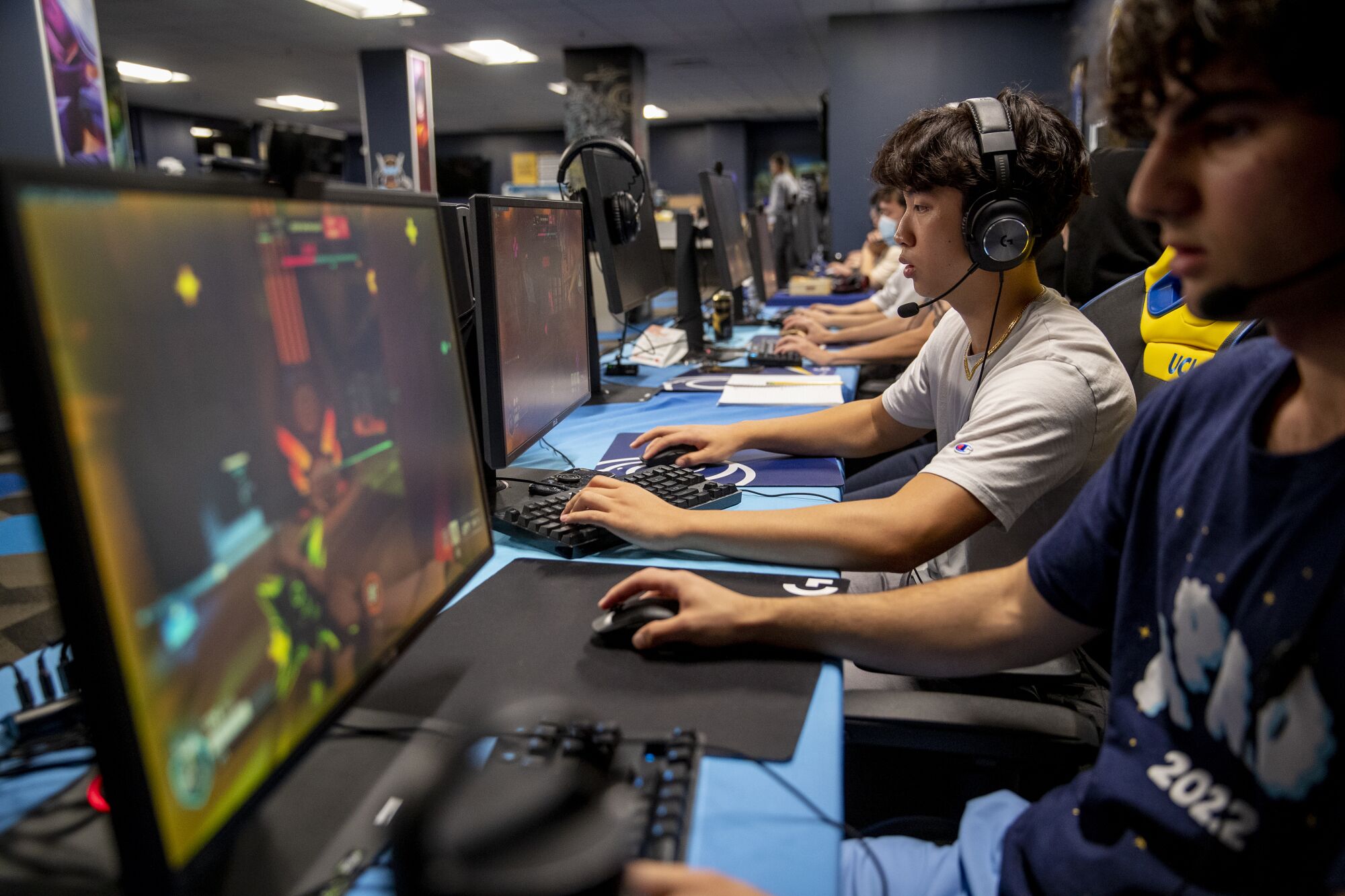 UCI students Jonathan Chao and Cyrus Buffington play Overwatch 2 competition.