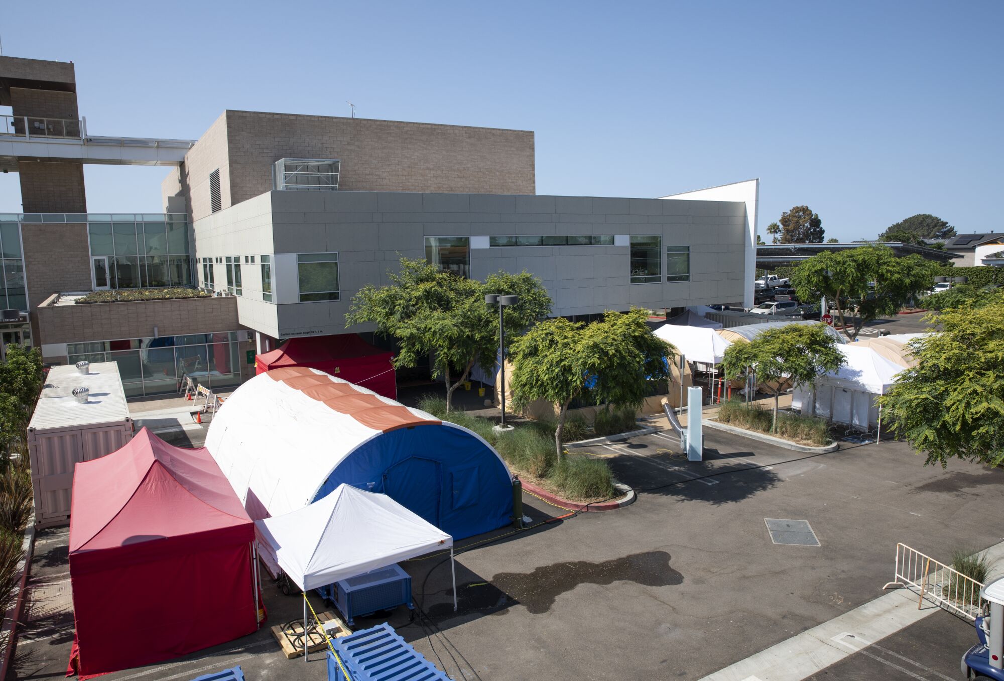 Field tents that provide full-service patient care are set up outside of the Scripps Memorial Hospital Encinitas on Friday.