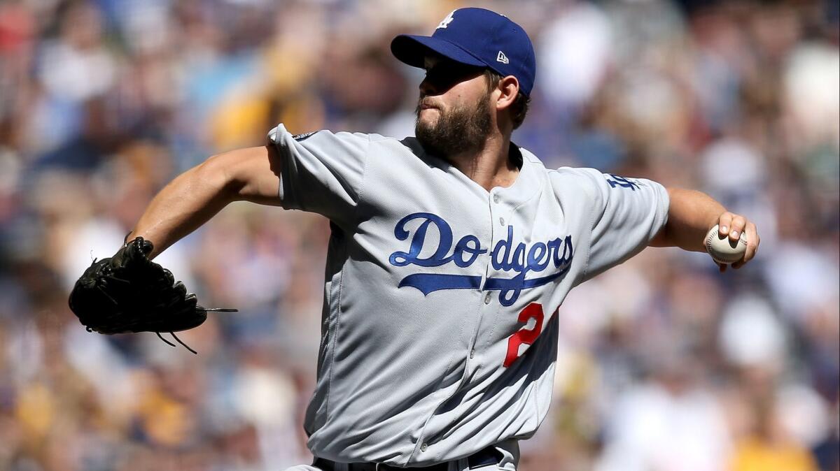 Clayton Kershaw delivers a pitch during the second inning of the Dodgers' 6-5 victory over the Milwaukee Brewers on Sunday.