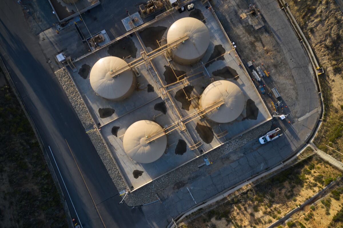 Natural gas storage tanks seen from above.
