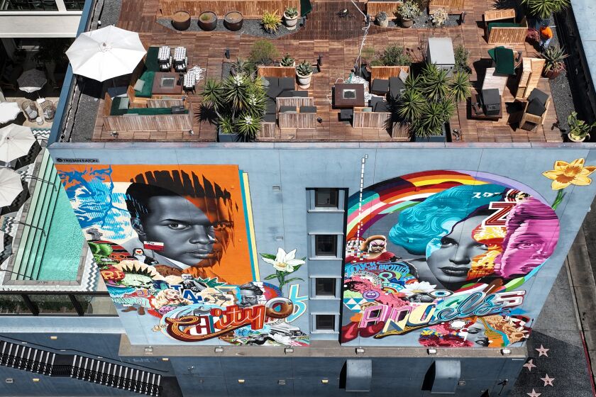 Los Angeles, CA, Tuesday, September 6, 2022 - A mural painted by artist Tristan Eaton is featured on the Aster club/hotel on Vine St. The Aster, which opened in August, is one of a number of exclusive, private clubs opening in Los Angeles. (Robert Gauthier/Los Angeles Times)