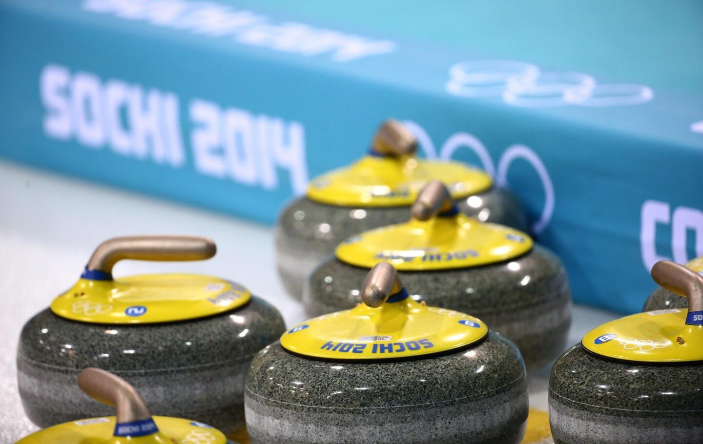 Curling stones used in a round-robin match Monday between Germany and Canada during the curling tournament at the Olympic Games in Sochi, Russia.