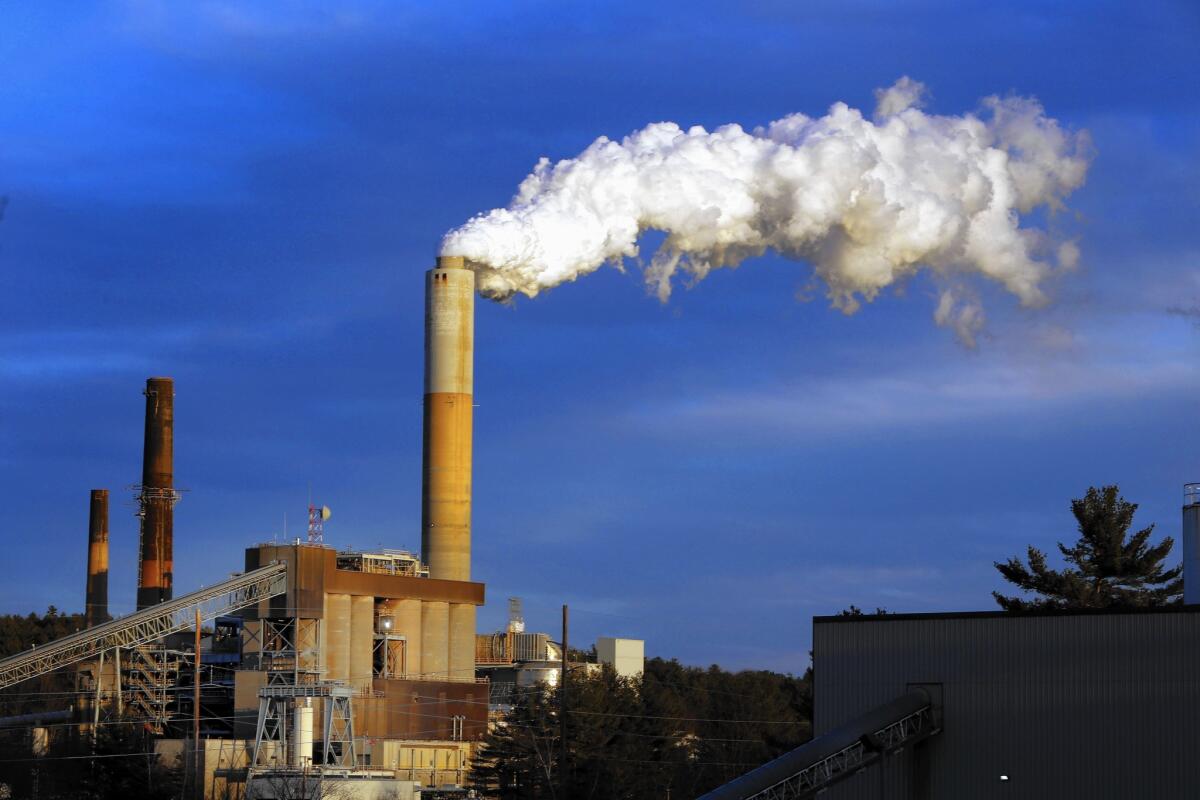 Steam billows from the coal-fired Merrimack Station in Bow, N.H. President Obama's Clean Power Plan poses significant challenges for states that rely on coal-fired power plants for much of their electricity.