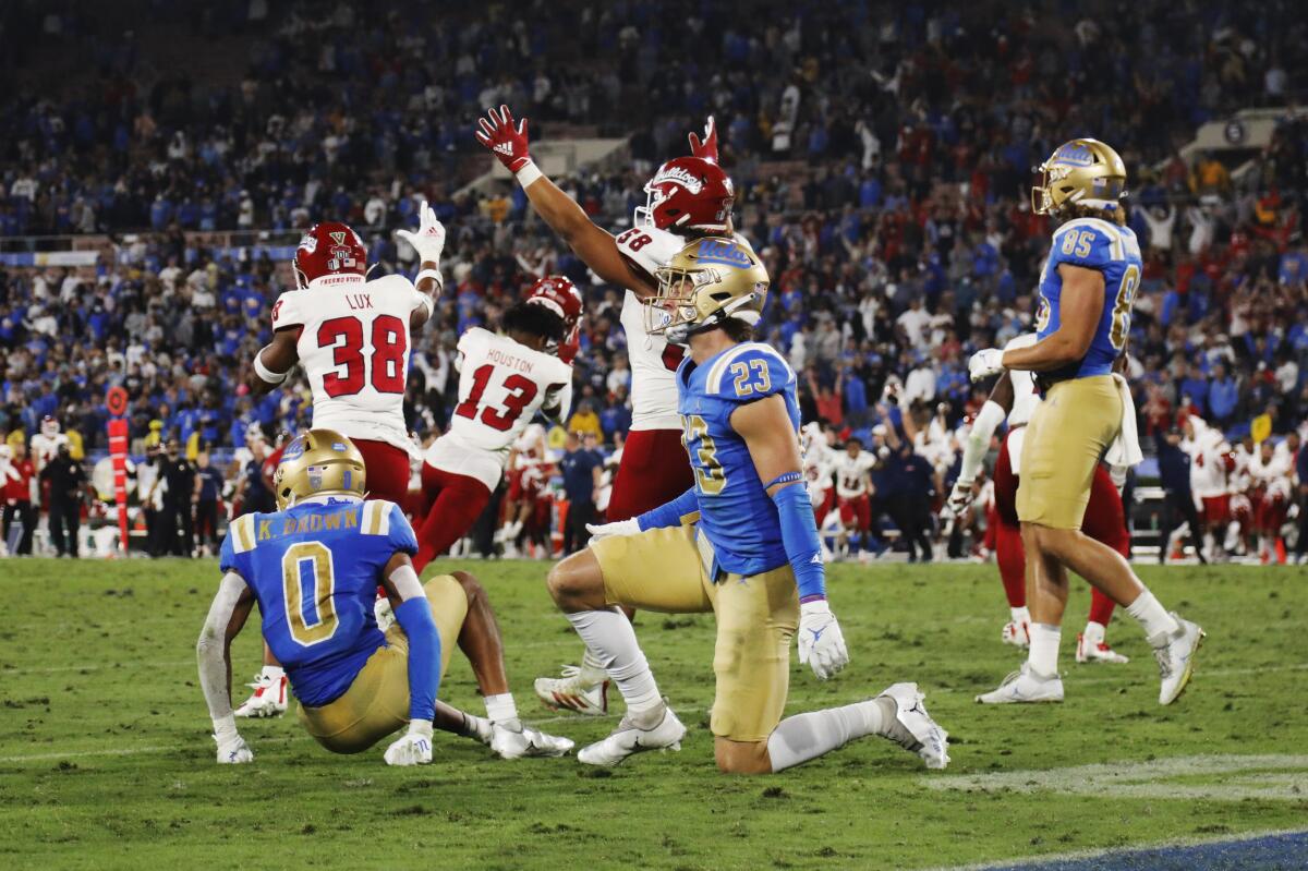 Fresno State celebrates their 40-37 win after a UCLA Hail Mary pass in the final seconds fails to connect.