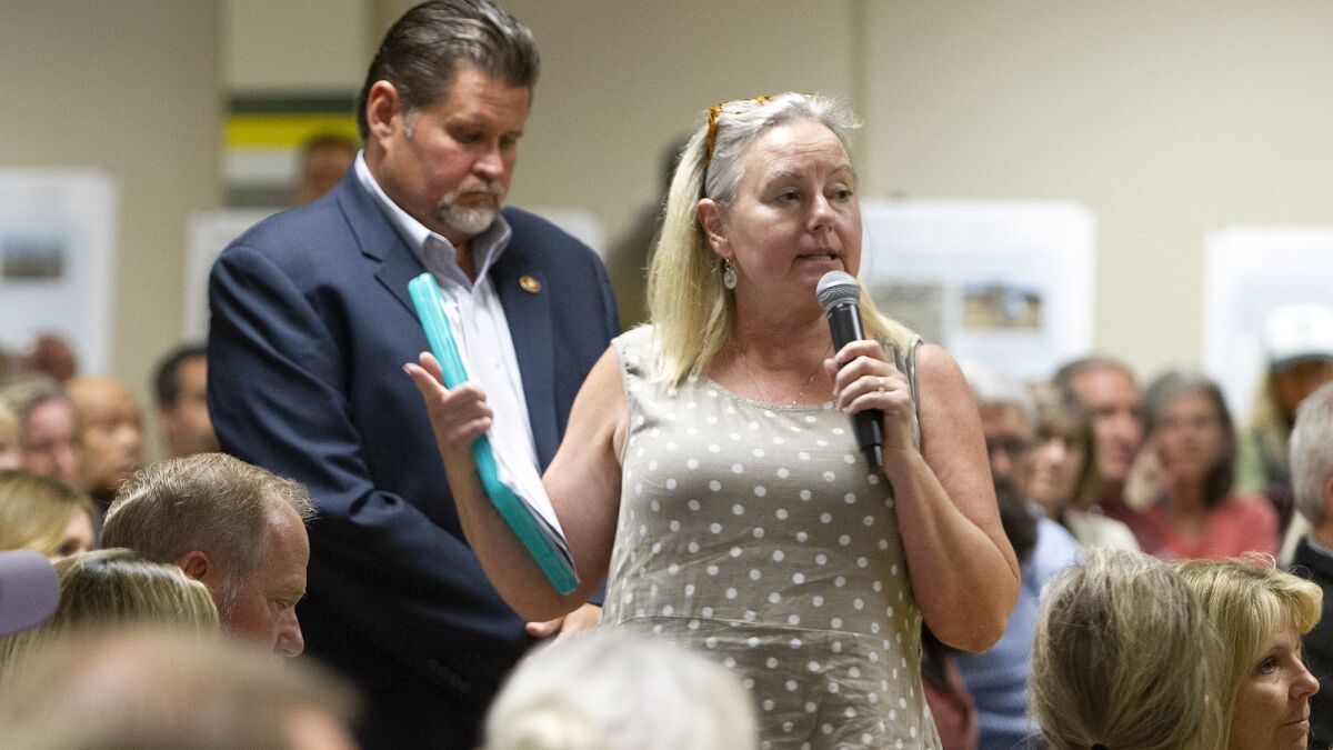 Huntington Beach resident Sharon Messick voices her concerns during Thursday’s meeting.