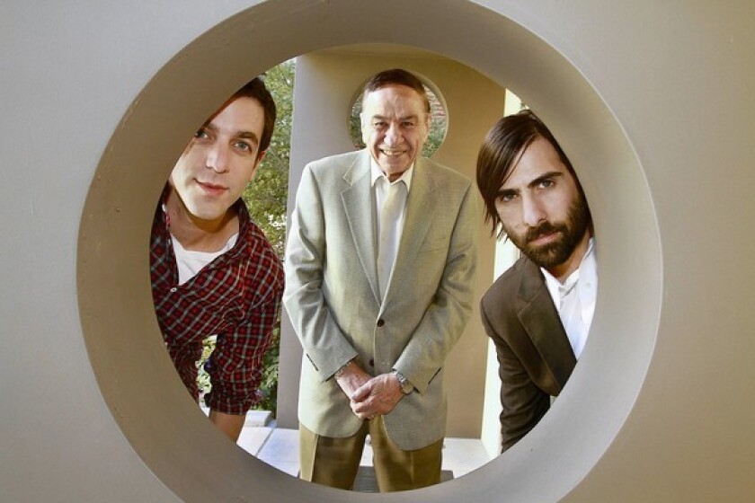 BJ Novak(left) and Jason Schwartzman (right) who play legendary Disney songwriters Richard and Robert Sherman in the new movie "Saving Mr. Banks," pose along with the real Richard Sherman (center).