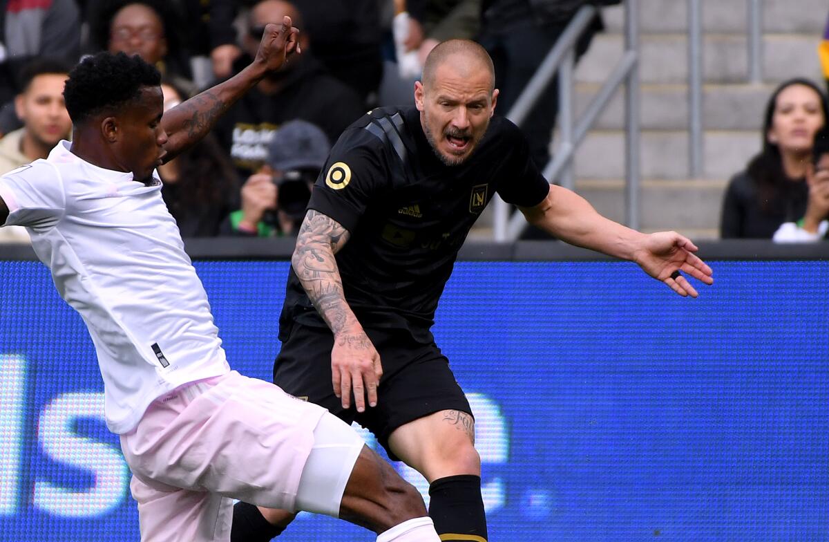 LAFC defender Jordan Harvey reacts after Inter Miami's Alvas Powell blocks his pass during LAFC's season opener on March 1.