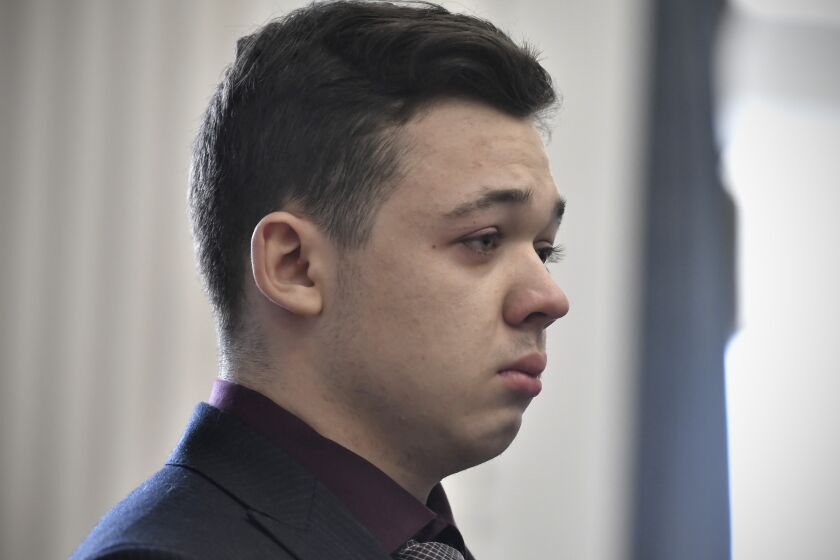 FILE - Kyle Rittenhouse keeps his composure while starting to cry as he is found not guilty on all counts on Nov. 19, 2021, at the Kenosha County Courthouse in Kenosha, Wis. A federal judge in Wisconsin on Wednesday, Feb. 1, 2023, ruled that a civil rights wrongful death lawsuit filed by the father of a man shot and killed by Rittenhouse during a protest in 2020 can proceed against city officials, police officers, Rittenhouse and others. (Sean Krajacic/The Kenosha News via AP, Pool, File)