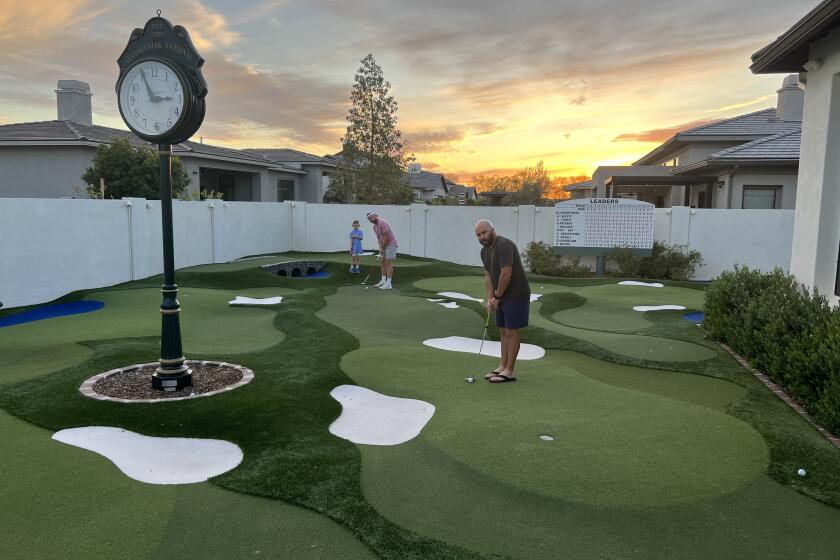 Andrew Augustyniak created a miniature version of Augusta National Golf Club in his backyard in Gilbert, Ariz.