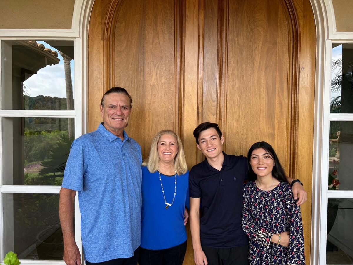 Michael and Jill Duoto, founders of High Bluff Academy, with Afghan students Mohammad and Aqila Mohammadi.