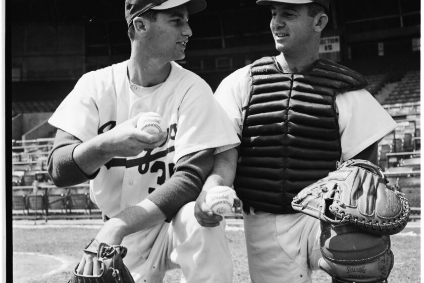 Norm Sherry (on right) and his brother Larry in 1958.