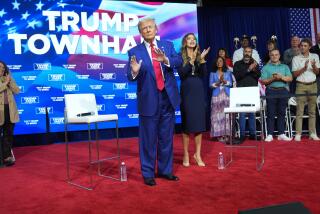 OAKS, PA - October 14 : Republican presidential nominee former President Donald Trump dances on stage with South Dakota Gov. Kristi Noem, during a town hall event held at the Greater Philadelphia Center & Fairgrounds, in Oaks, PA on Monday, Oct. 14, 2024. (Photo by Jabin Botsford/The Washington Post via Getty Images)