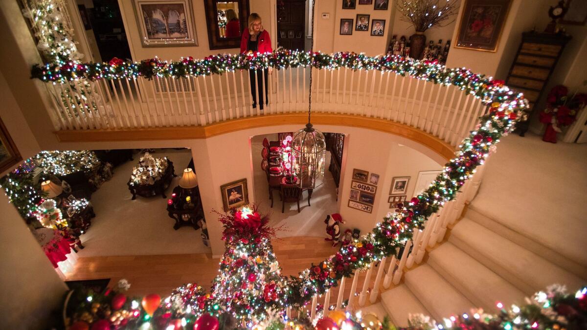 The garland on the staircase takes hours to dress.