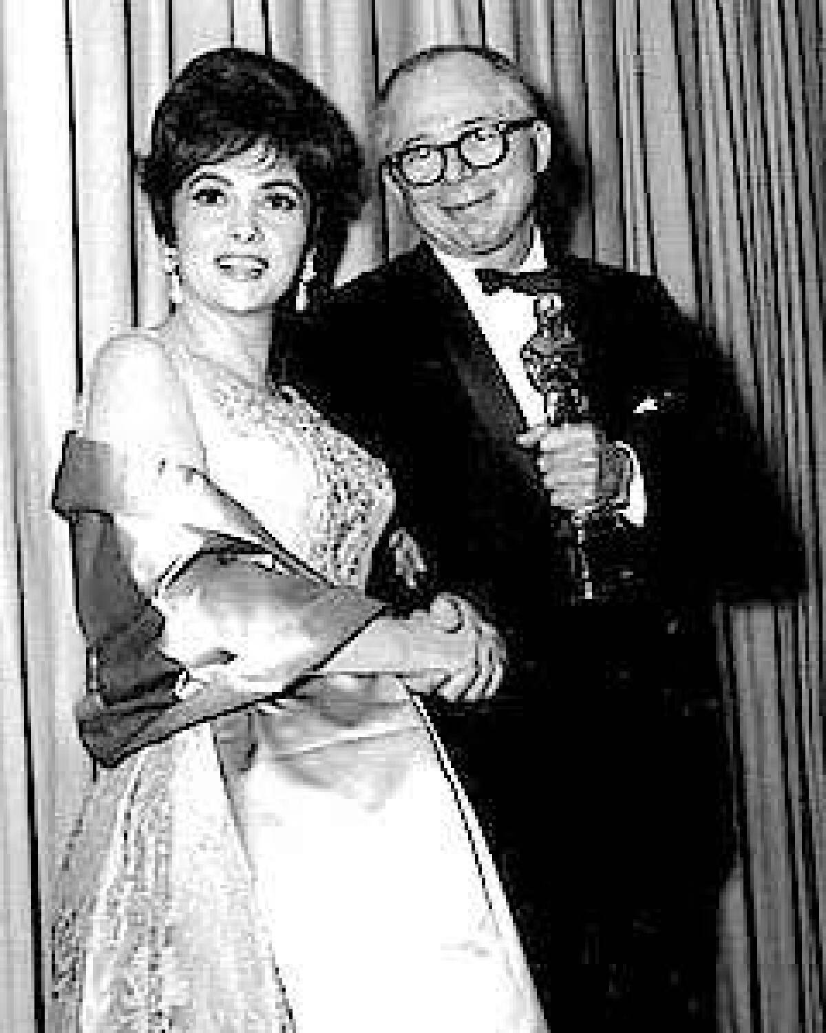 Gina Lollobrigida at the awards ceremony with Billy Wilder.