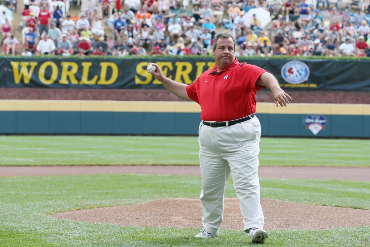 New Jersey Gov. Chris Christie throws out the ceremonial first pitch before the start of the Little League World Series championship game in Williamsport, Pa.