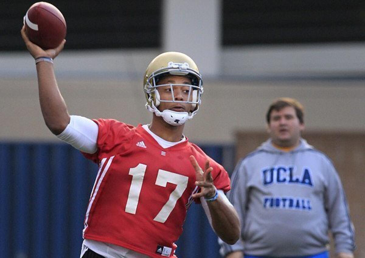 UCLA quarterback Brett Hundley makes a pass during a practice earlier this month.