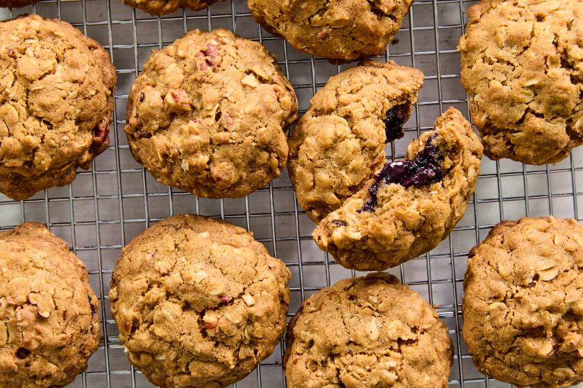 Maple blueberry oatmeal cookies on a cooling rack