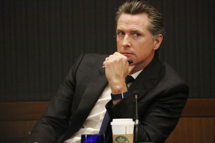 LOS ANGELES, CA - MARCH 14, 2018 - California Lt. Governor and University of California (U.C.) Regent Gavin Newsom listens to speakers during the University of California Board of Regents meeting at UCLA on Wednesday March 14, 2018 at the Luskin Conference Center. (Al Seib / Los Angeles Times)