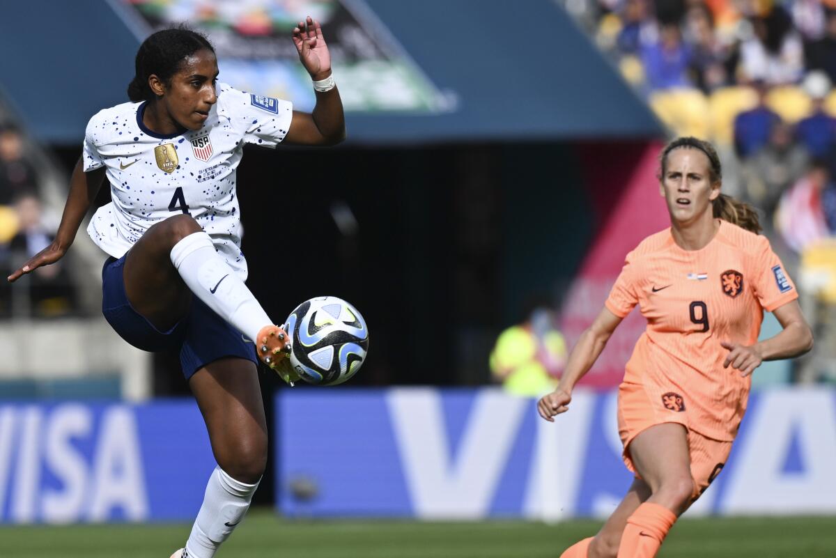 U.S. defender Naomi Girma, left, controls the ball during a World Cup match against the Netherlands in July.