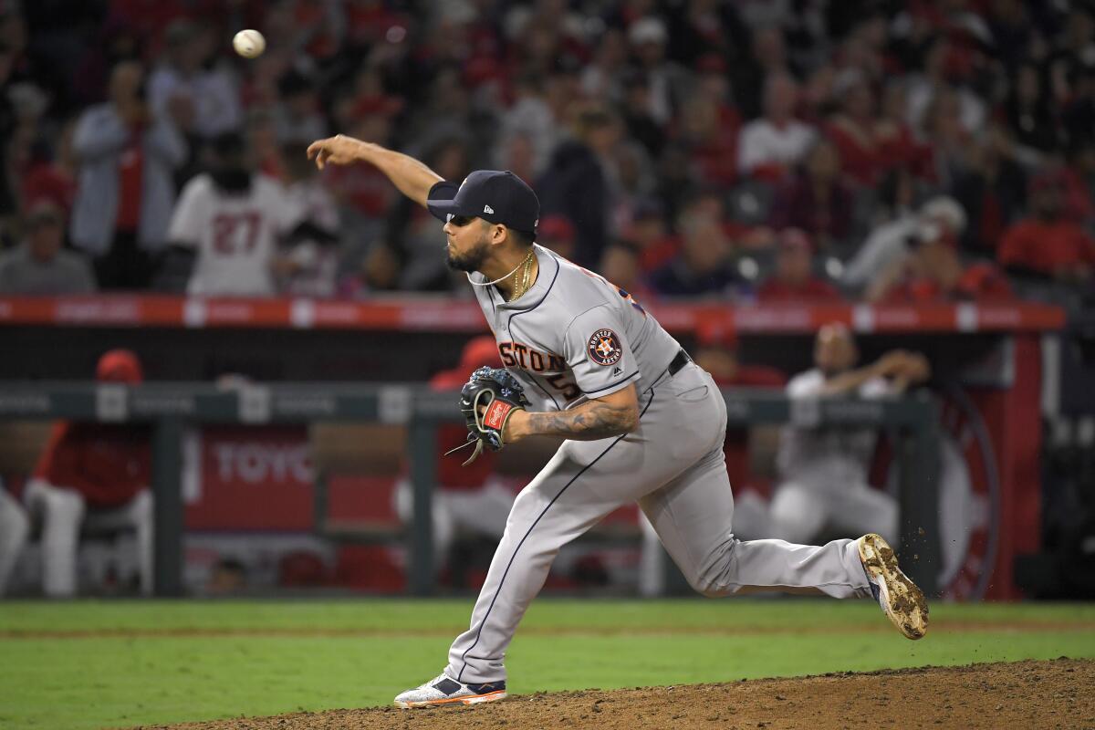 Houston Astros reliever Roberto Osuna pitches against the Angels on Sept. 28, 2019, in Anaheim.