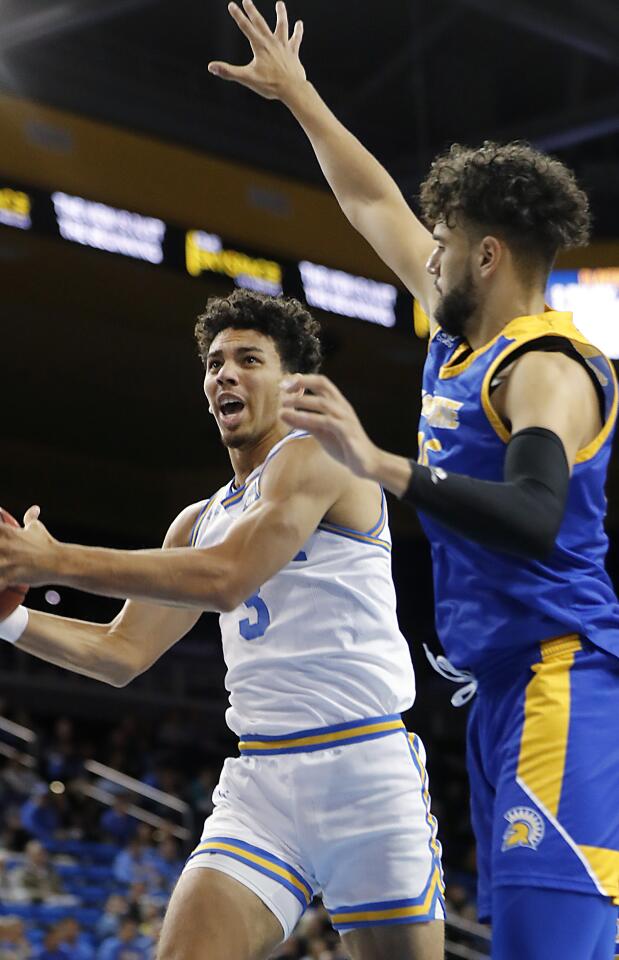 UCLA guard Jules Bernard drives to the basket during the second half.