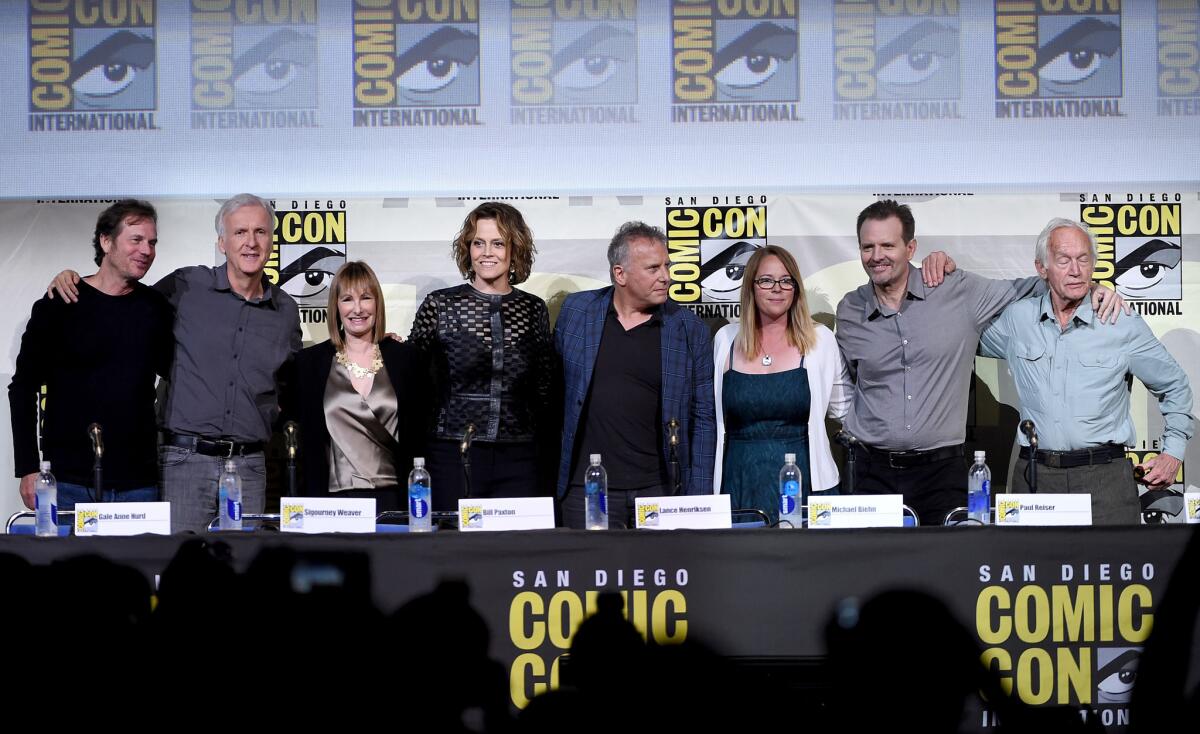 Bill Paxton, James Cameron, Gale Anne Hurd, Sigourney Weaver, Paul Reiser, Carrie Henn, Michael Biehn, and Lance Henriksen attend the "Aliens: 30th Anniversary" panel during Comic-Con 2016.