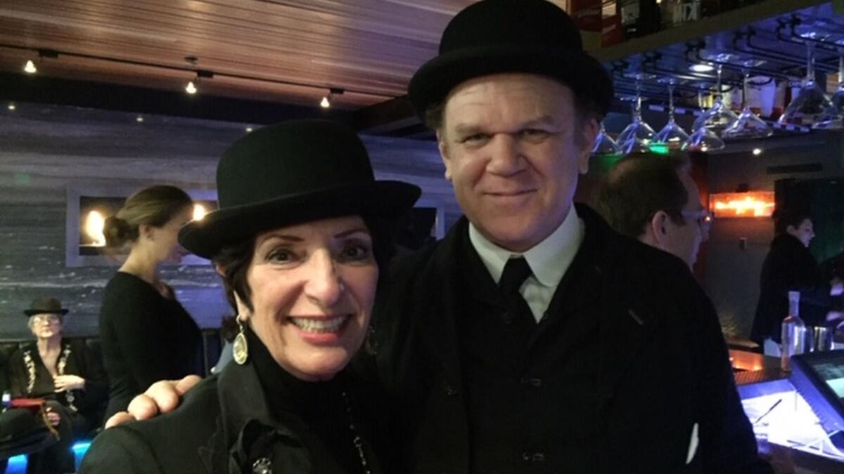 Hollywood based A Haunting We Will Go tent member Diana Wright poses with actor John C. Reilly, who plays Oliver Hardy in the movie "Stan and Ollie' at the movie premiere's after-party, Nov 14, 2018.