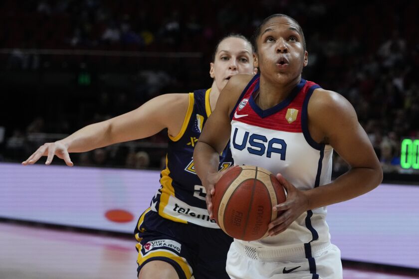United States' Alyssa Thomas prepares to shoot as Bosnia and Herzegovina's Milica Deura watches during their game at the women's Basketball World Cup in Sydney, Australia, Tuesday, Sept. 27, 2022. (AP Photo/Mark Baker)