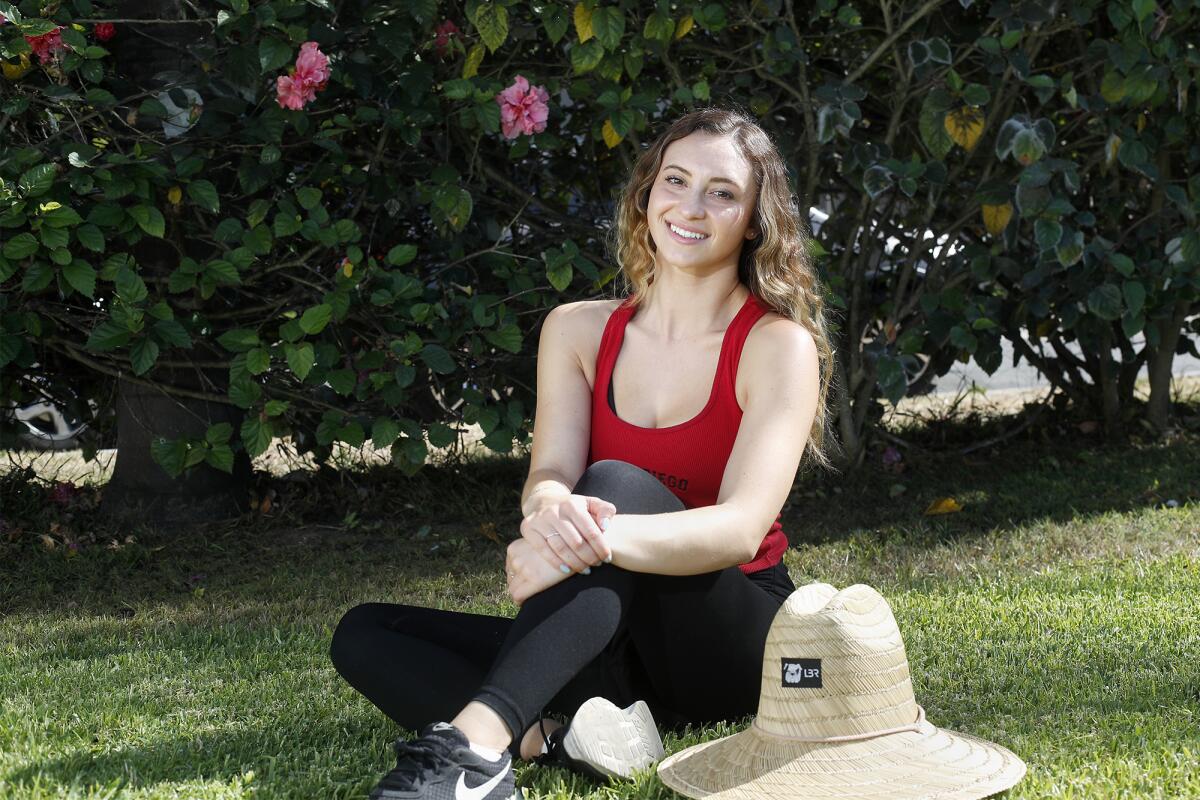 Huntington Beach resident Tiffany Gil, 21, is competing in a cross-country lawnmower race beginning Friday.