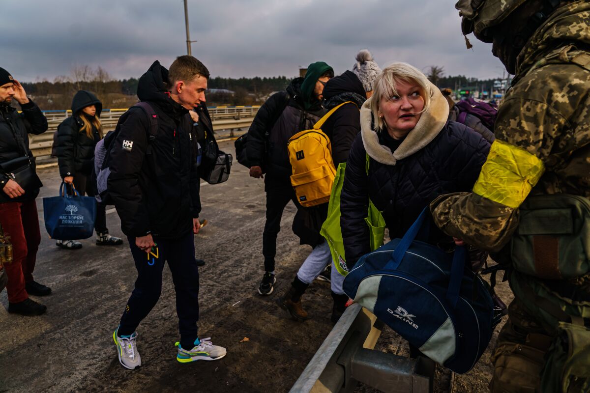 Civilians escaping the fighting between Russian and Ukrainian forces