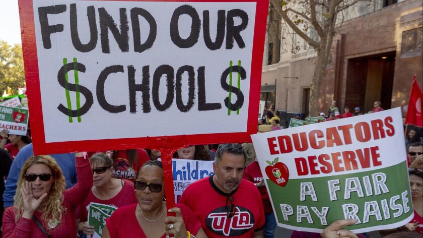 Los Angeles teachers, who are about to go on strike, put forward a central demand for education funding during a rally downtown in December.