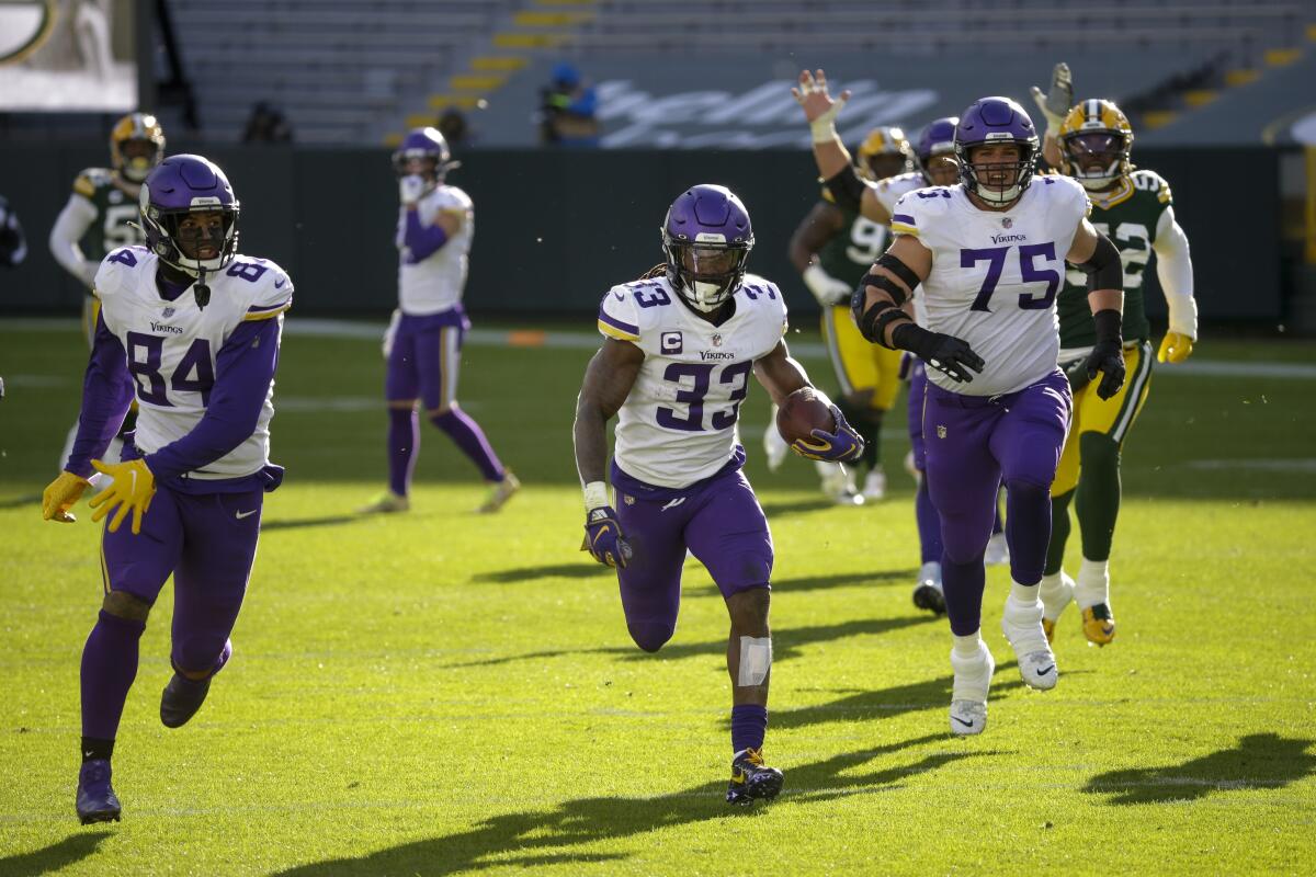 Minnesota Vikings running back Dalvin Cook breaks away for a touchdown.
