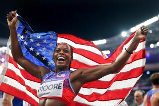 PARIS, FRANCE August 3, 2024-USA's Jasmine Moore celebrates the bronze medal.