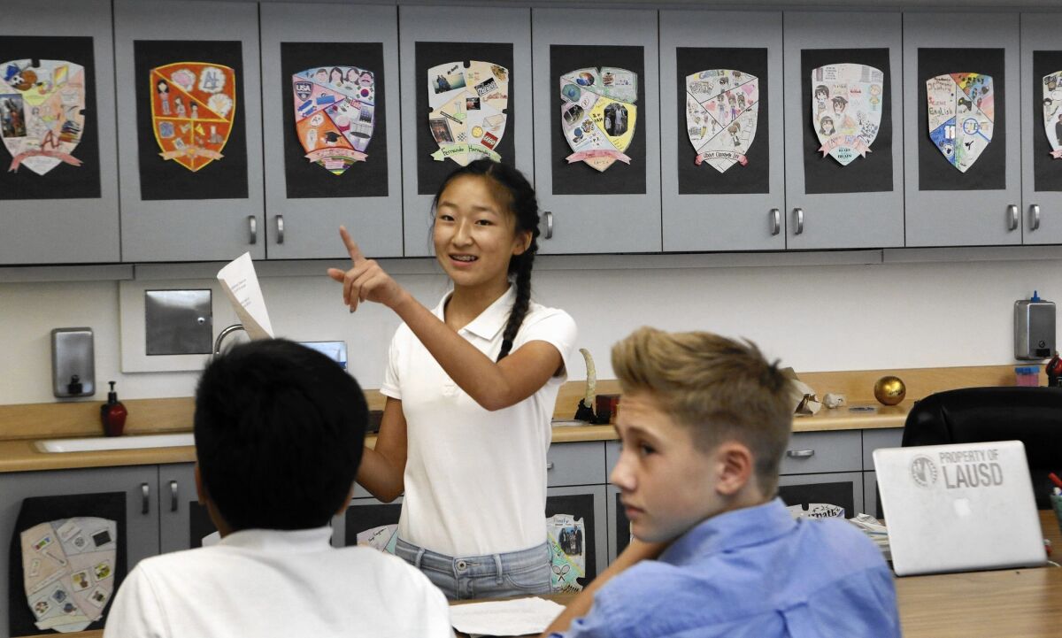 President of the leadership class Caitlyn Cho appoints other students to tasks at Porter Ranch Community School.